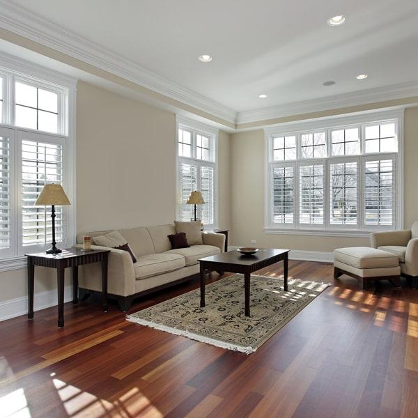 laminate floors are a cost-effective, durable, and easy-to-maintain option that can mimic the look of hardwood or tile